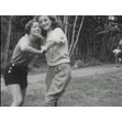 Dorothy Willinksy and another girl dancing at Camp Arowhon on visiting day, 1940s. Ontario Jewish Archives, Blankenstein Family Heritage Centre, fonds 81 (film still).|